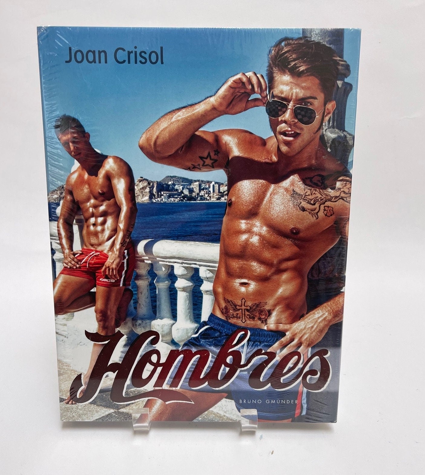 Hombres by Joan Crisol 2013, Hardcover Book MINT Condition, In Original Plastic. Published by Bruno Gmunder. Mature